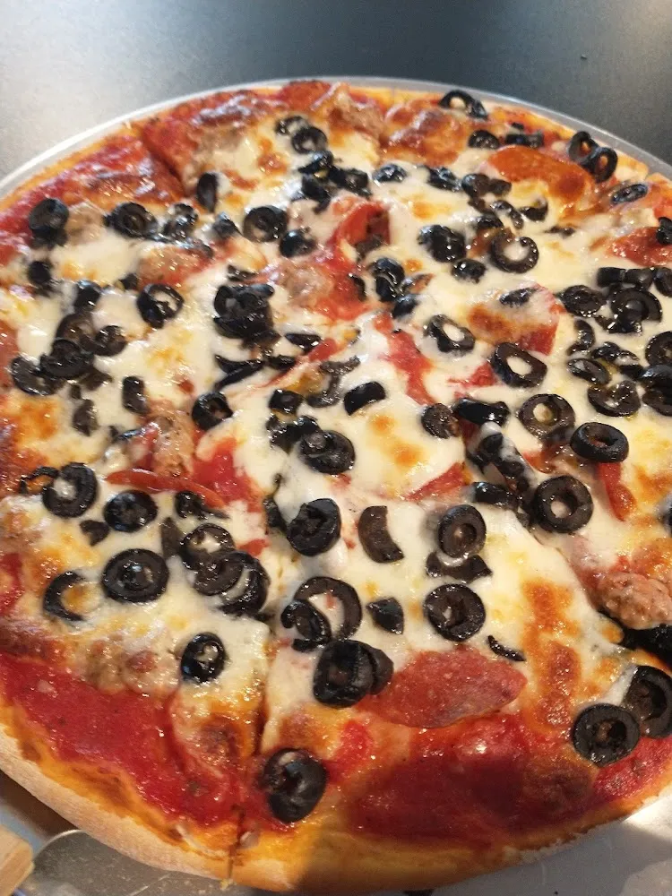 Sausage Pepperoni and Black Olive Pizza